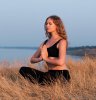 woman-in-relaxed-pose-near-ocean.jpg