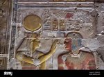 ancient-egyptian-bas-relief-showing-the-goddess-hathor-placing-the-sacred-ankh-cross-to-pharao...jpg